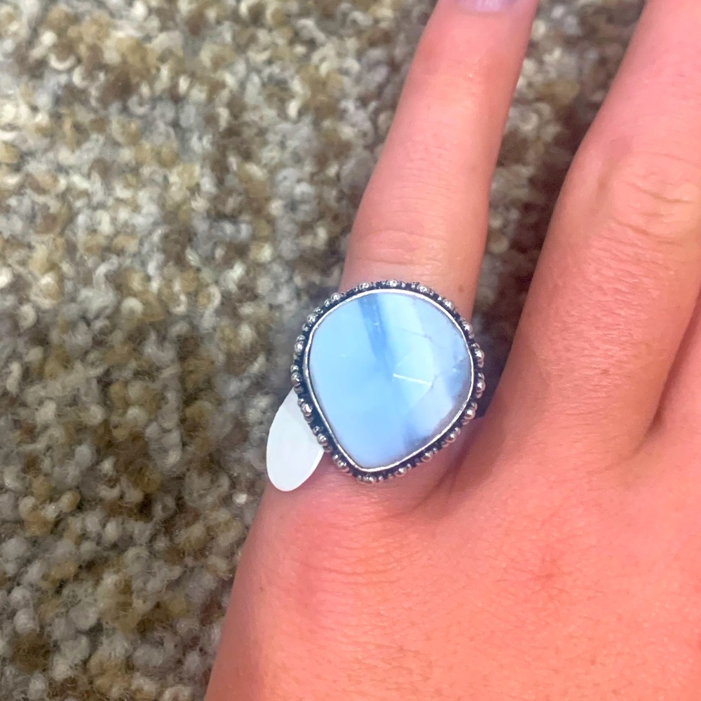 Blue Gemstone Ring with an Adjustable Band